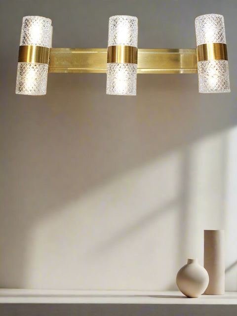 Luxury crystal glass wall light with gold metallic frame – elegant dual-headed design for premium home or hotel interiors by Tatva Lights.