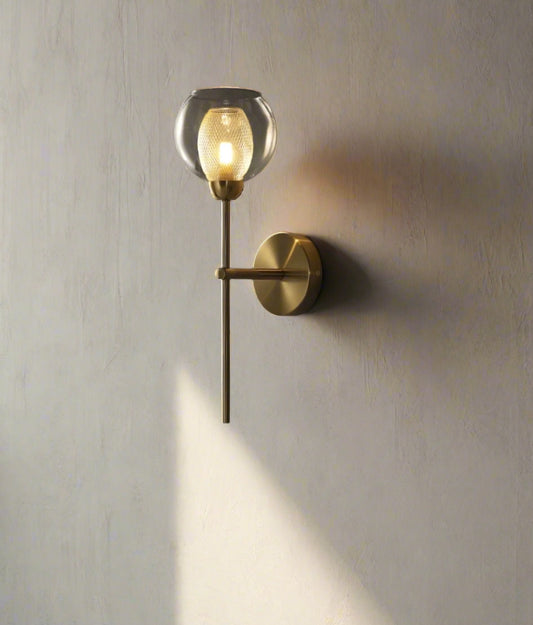 Tatva Lights American Exquisite Glass Iron Wall Sconce showcasing a vintage-inspired iron frame paired with a fluted glass shade, delivering a warm, timeless glow—perfect for traditional hallways, living rooms, or rustic interiors.