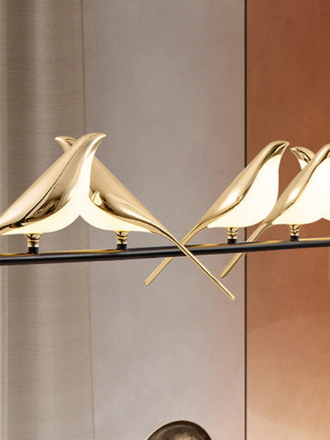 Tatva Lights Birdie Nest Pendant features a whimsical, nature-inspired design with delicate bird accents perched on a nest-like circular frame, paired with soft warm lighting—perfect for adding charm to cozy corners, kids' rooms, or artistic interiors.