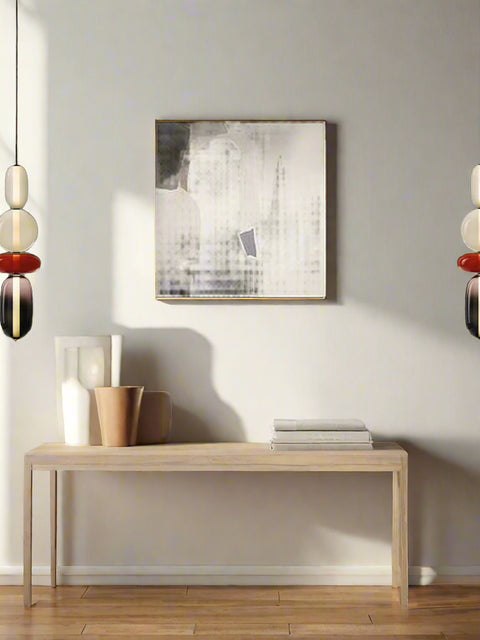 Tatva Lights Borosil Glow Pendant showcases a sleek, contemporary design with a translucent borosilicate glass shade, offering soft ambient illumination—ideal for modern kitchens, dining areas, or minimalist interiors.