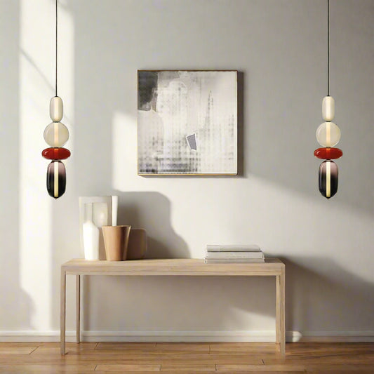 Tatva Lights Borosil Glow Pendant showcases a sleek, contemporary design with a translucent borosilicate glass shade, offering soft ambient illumination—ideal for modern kitchens, dining areas, or minimalist interiors.