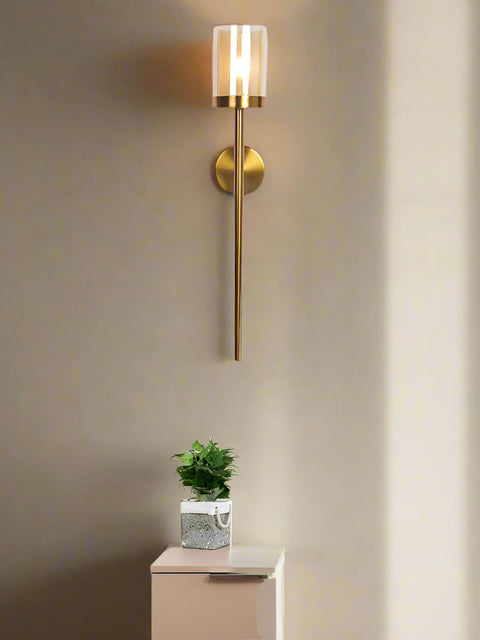 Tatva Lights Brivio Glass Iron Linear Wall Light – Sleek linear wall sconce with a clear glass diffuser and matte black iron frame, ideal for modern hallways, vanities, or contemporary bedroom lighting.