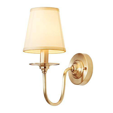 Elegant wall light with a gold-finished metal body and a soft white fabric lampshade by Tatva Lights, designed to enhance interior spaces with a warm and ambient glow—perfect for bedrooms, living rooms, and hallways.