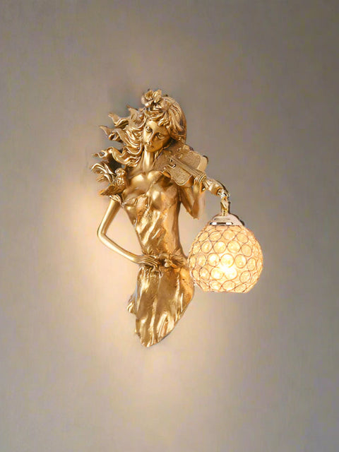 Tatva Lights “Crystal Feather Deer” Metal Wall Lamp combines artistic luxury with functional lighting.
Features a sleek golden deer motif with crystal feather detailing, perfect for elegant wall décor.
Ideal for statement interiors, living spaces, or upscale lobbies seeking designer wall lighting.