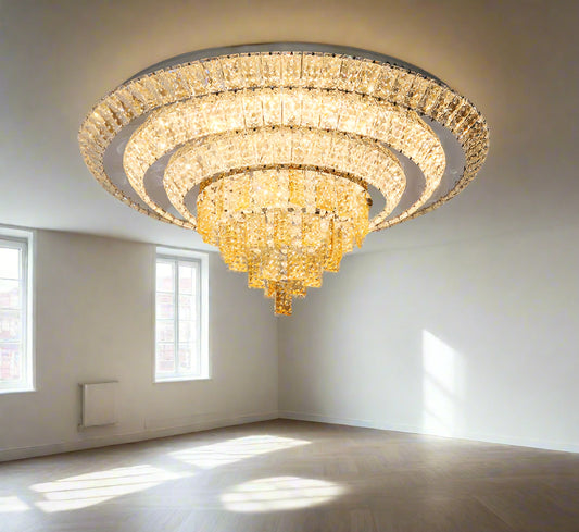 Tatva Lights Crystal Luxe 3-Layer LED Chandelier featuring elegant cascading crystal rings, available in silver, gold, and dual-tone finishes—perfect for adding luxurious ambiance to modern spaces.