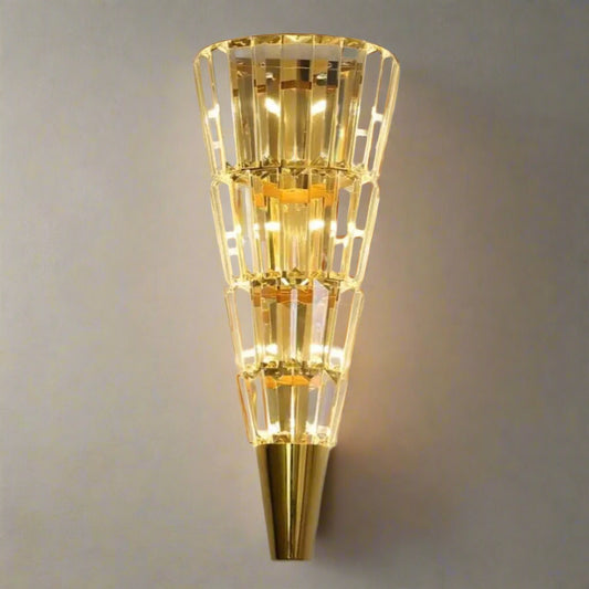 Tatva Lights Luxury gold crystal wall sconce light fixture with tiered design and warm LED illumination – perfect for modern living rooms, bedrooms, hallways, and luxury interiors.