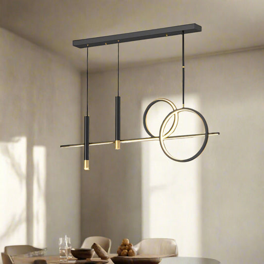 A modern black LED chandelier pendant light with five light fixtures, hanging over a kitchen island.