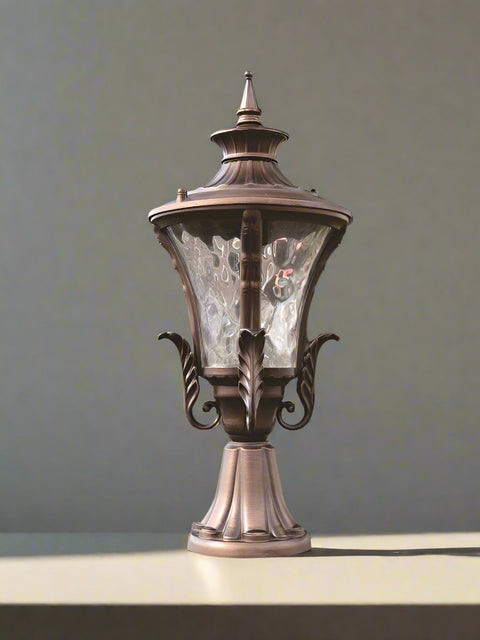 Tatva Lights Exquisite Aluminum Outdoor Pillar Lantern with a durable weather-resistant aluminum frame, clear glass panels, and warm LED illumination—ideal for garden pathways, entrance gates, or patio pillars