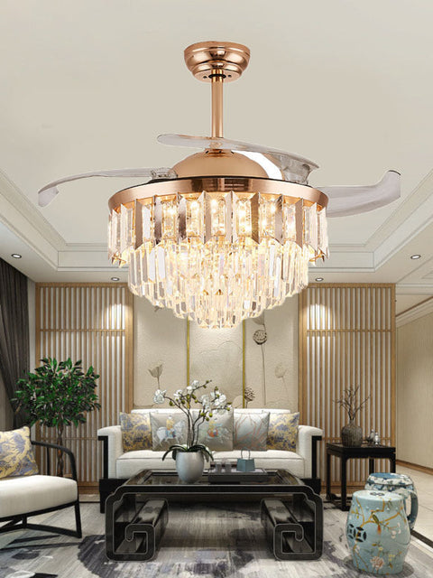 Tatva Lights Frosté Crystal Fan Chandelier featuring a modern fusion of functionality and elegance, with clear crystal accents and sleek fan blades. Ideal for living rooms, dining areas, or bedrooms seeking a touch of luxury and cooling comfort.