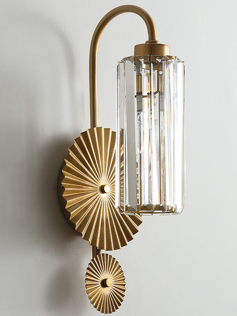 Tatva Lights Gold Metal LED Crystal Wall Light features a luxurious gold-finished frame adorned with sparkling crystal accents, offering elegant ambient lighting ideal for hallways, living rooms, or upscale interiors.