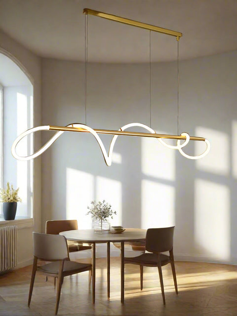 Tatva Lights Haloren Suspension Chandelier featuring a multi-ring suspended design with a brushed gold finish and integrated LED lighting—ideal for modern living rooms, high-ceiling lobbies, or contemporary dining areas.