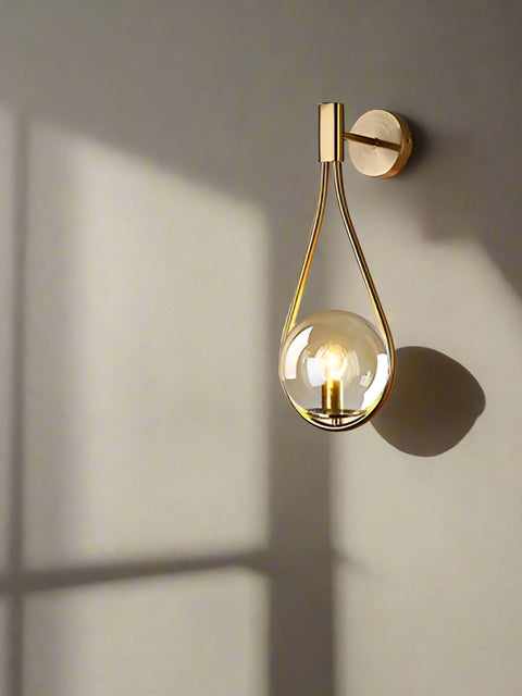 Tatva Lights – Leaf Ring Modern LED Chandelier featuring an elegant circular design inspired by natural leaf patterns, integrated warm LED lighting, and a luxurious gold finish, perfect for modern living or dining spaces.