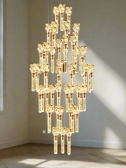 Tatva Lights Lpheion Crystal Petal Chandelier – Luxurious floral-inspired LED chandelier with layered crystal petals and a gold finish, perfect for elegant living rooms, dining areas, or grand foyers