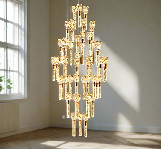 Tatva Lights Lpheion Crystal Petal Chandelier – Luxurious floral-inspired LED chandelier with layered crystal petals and a gold finish, perfect for elegant living rooms, dining areas, or grand foyers