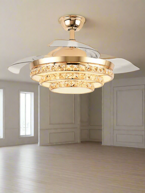 Tatva Lights Majestic Breeze Crystal Fan Chandelier — a luxurious fusion of sparkling crystal elegance and modern functionality, featuring retractable fan blades, integrated LED lighting, and a stunning centerpiece design ideal for upscale living rooms, bedrooms, or lounges