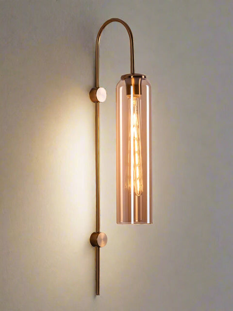 Tatva Lights Modern gold wall light with elongated glass shade and exposed Edison bulb – sleek contemporary sconce for ambient indoor lighting, ideal for living rooms, bedrooms, and hallways