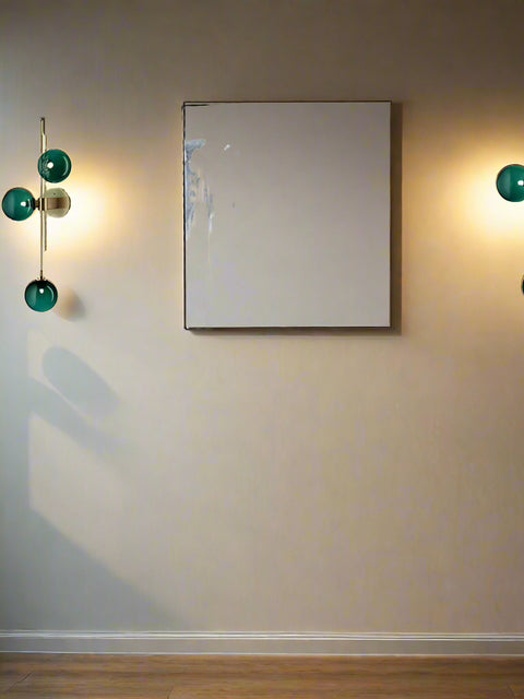 Tatva Lights Nordic Orion Wall Light with a clean, minimalist design and smooth metallic finish, perfect for modern interiors or exteriors, offering soft ambient illumination.