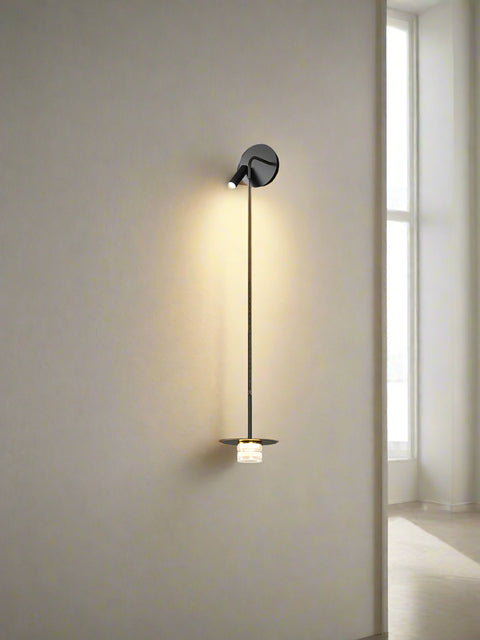 Tatva Lights One-Light Wall Fixture featuring a sleek, minimalist design with a single bulb setup, perfect for accent lighting in hallways, bedrooms, or modern interiors. Combines functionality with subtle elegance for versatile wall illumination