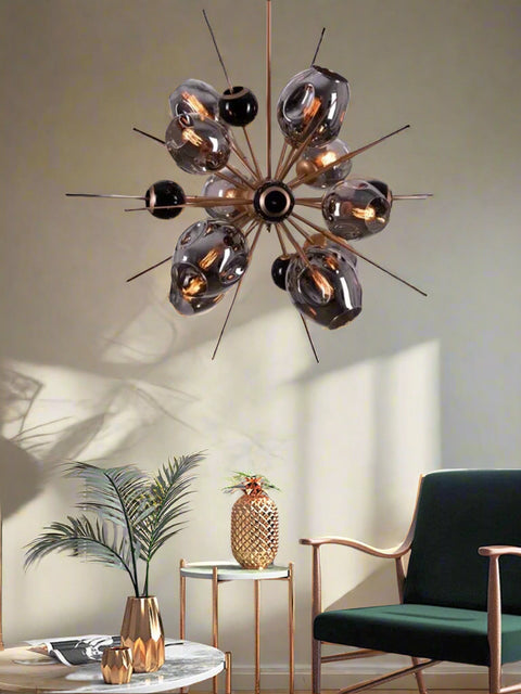 Tatva Lights Pavo Black Chandelier – A striking black-finished chandelier with elegant arms and warm ambient lighting, designed to add a touch of sophistication to modern interiors.