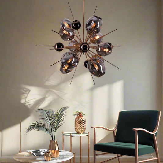 Tatva Lights Pavo Black Chandelier – A striking black-finished chandelier with elegant arms and warm ambient lighting, designed to add a touch of sophistication to modern interiors.