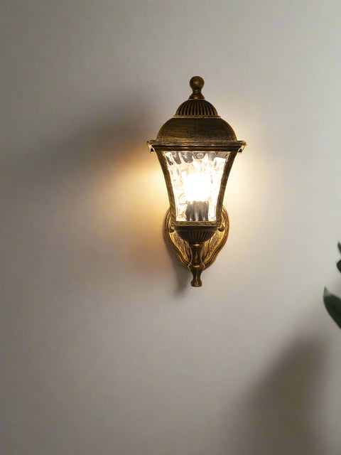 Tatva Lights Ripple Glow Outdoor Wall Light – A stylish and weather-resistant fixture with a ripple-textured design, casting warm, diffused light to elevate your outdoor spaces.