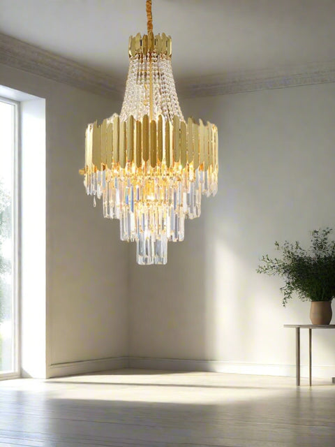 Tatva Lights – Royal Pietra Crystal Chandelier featuring cascading precision-cut crystals, a luxe metallic frame, and integrated LED lighting, perfect for elevating grand interiors with timeless elegance and brilliance.