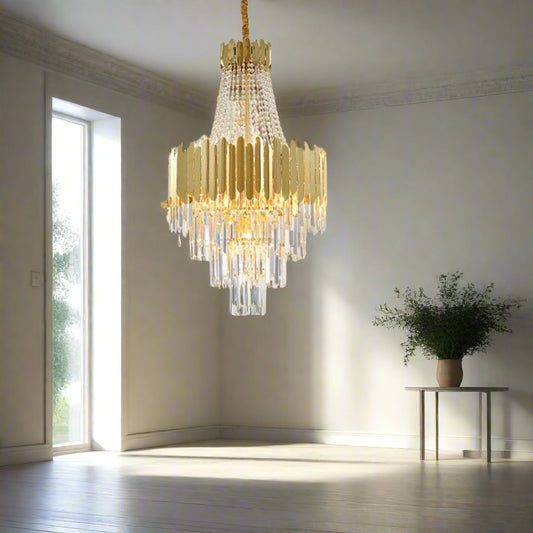 Tatva Lights – Royal Pietra Crystal Chandelier featuring cascading precision-cut crystals, a luxe metallic frame, and integrated LED lighting, perfect for elevating grand interiors with timeless elegance and brilliance.