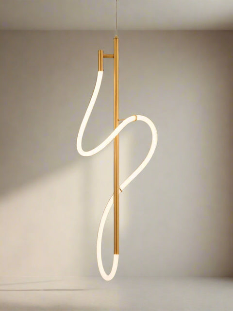 Tatva Lights LUMO Flow Pendant – a modern sculptural LED chandelier with a fluid wave-like design and sleek gold finish, perfect for contemporary luxury interiors.