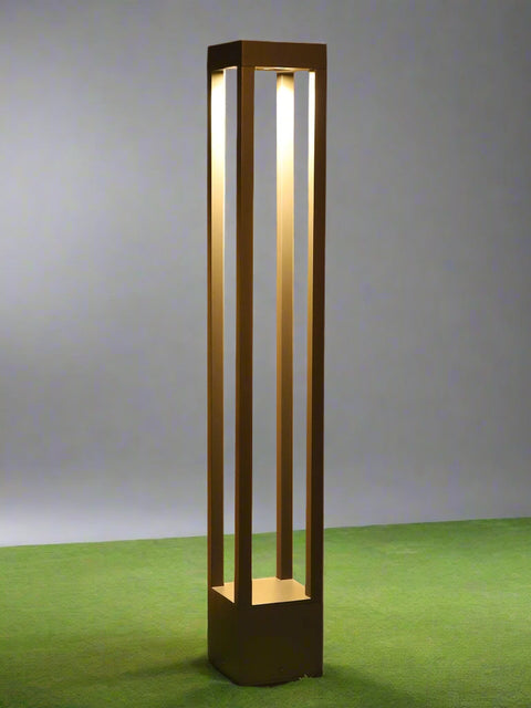 Tatva Lights – Striade Outdoor Light featuring a sleek, minimalist design with a vertical slatted pattern. Crafted for durability and style, this LED wall fixture casts a warm white glow, perfect for enhancing modern outdoor spaces such as balconies, gardens, and entrances.