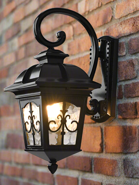 Tatva Lights Victorian Scroll outdoor wall lantern in black finish featuring ornate scrollwork and a vintage silhouette, perfect for adding timeless charm to outdoor exteriors.