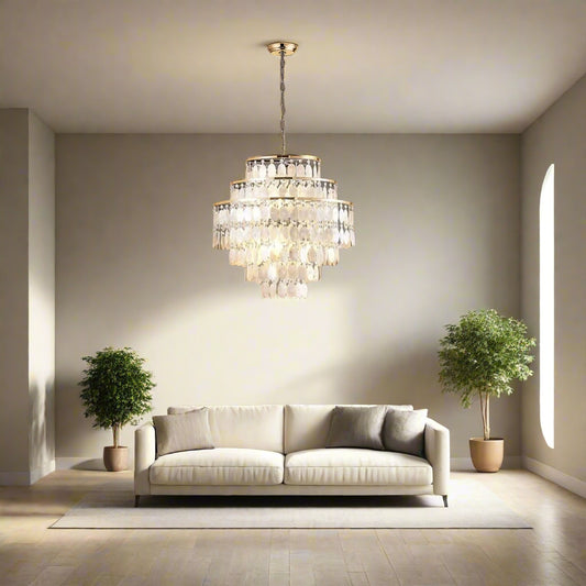 Tatva Lights White Husks Chandelier illuminating a modern living room with layered teardrop crystal design, perfect for luxury interiors, drawing rooms, and statement ceiling lighting décor.
