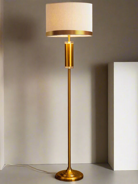 Tatva gold floor lamp with fabric drum shade – modern luxury standing light for living rooms, bedrooms, and reading corners