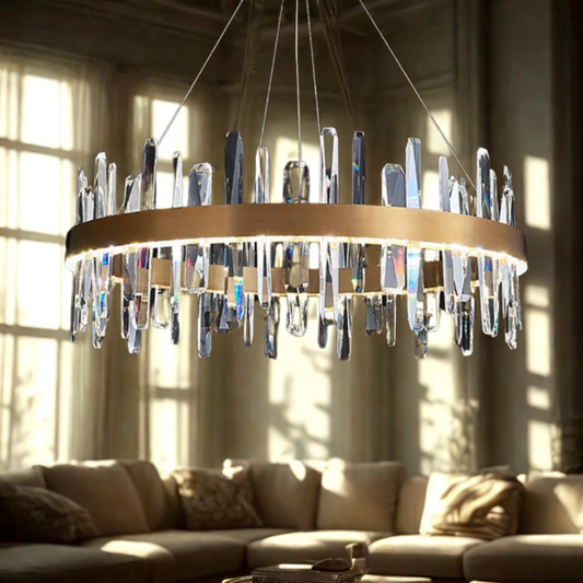 Tatva Lights Crystal Flare chandelier with radiant prism-cut crystals and a gold circular frame – luxurious LED hanging light for modern dining rooms, living areas, and premium interiors.