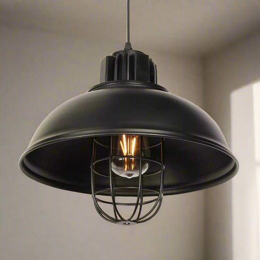 Tatva Lights industrial-style black metal cage pendant lamp with vintage Edison bulb – perfect for lofts, cafes, and rustic modern interiors