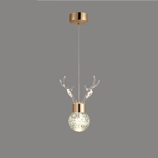 Tatva Lights Deer Horn Drop Pendant featuring an artistic antler-inspired design with a rustic metallic finish and warm LED glow—perfect for cabin-style interiors, dining spaces, or statement lighting in eclectic modern homes.