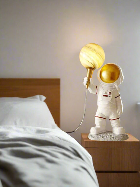Tatva Lights Decorative astronaut table lamp with golden planet bulb – unique space-themed night light for bedroom or kids’ room decor, modern astronaut bedside lamp for ambient lighting