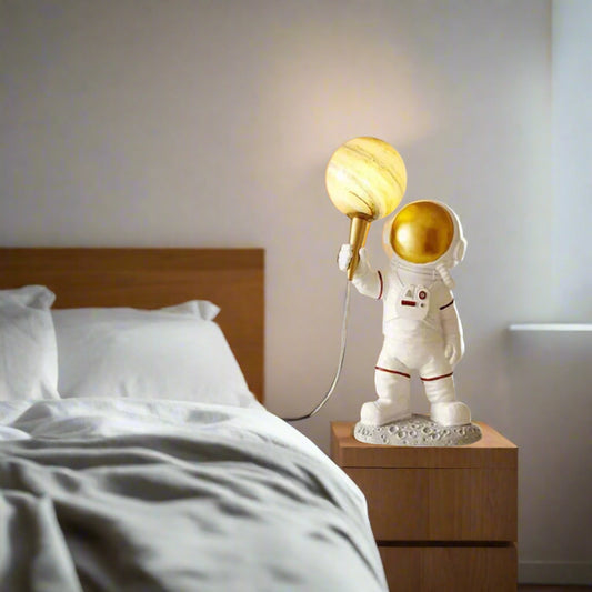 Tatva Lights Decorative astronaut table lamp with golden planet bulb – unique space-themed night light for bedroom or kids’ room decor, modern astronaut bedside lamp for ambient lighting