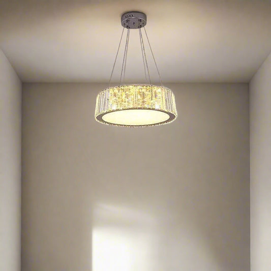 cascading crystal elements and integrated LED lighting. Suspended from the ceiling by sleek wires, this chandelier adds a sophisticated and radiant focal point to upscale interiors such as living rooms, dining areas, or grand entryways.