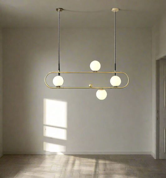 Tatva Lights Opulent Raindrop Chandelier showcases cascading crystal droplets suspended from a polished gold base, creating a luxurious rain-inspired design perfect for grand foyers, staircases, or high-ceiling living spaces.